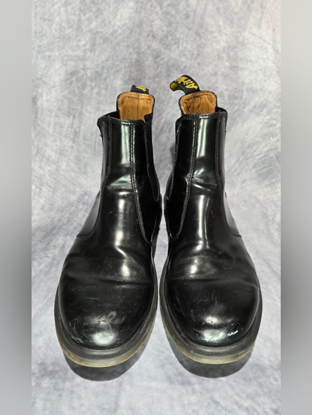 These boots are the iconic Dr. Martens 2976 Chelsea Boots